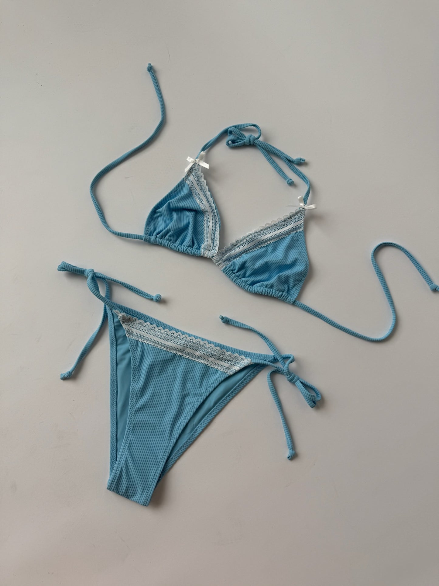 Blue Bikini With White Lace Trim